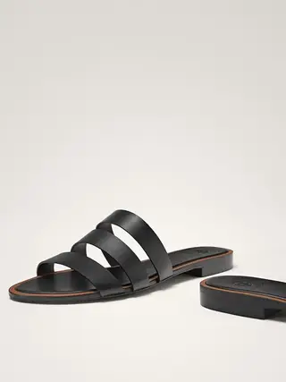Sandálias pretas multitiras (49,95 euros, antes 89,95 euros) Massimo Dutti
