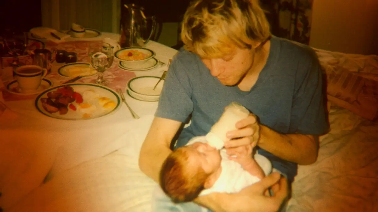Kurt Cobain e a filha, nascida em agosto de 1992