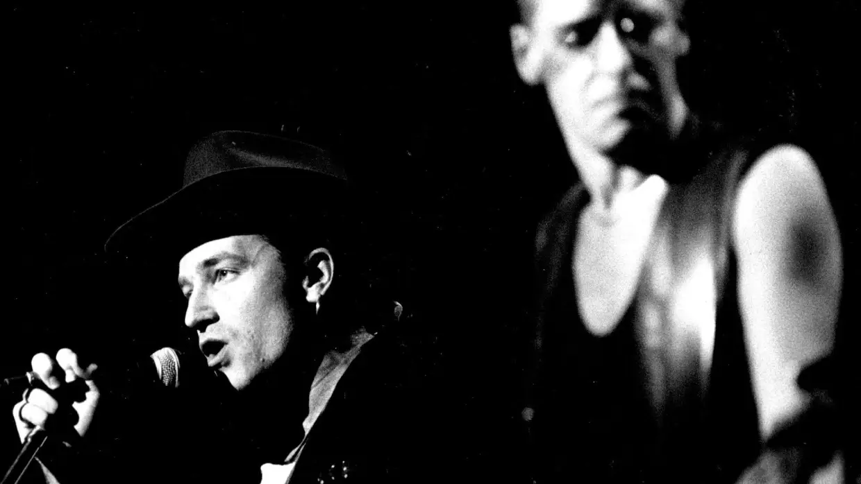 Bono e Adam Clayton no concerto em Denver, outono de 1987