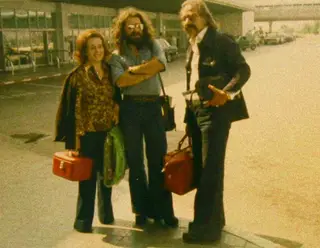 Com os pais, nos anos 70