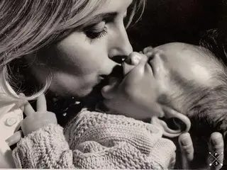 Marisa Cruz com o filho mais velho, João