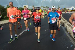 Tiago Dionísio (à direita) e a mulher, durante uma prova