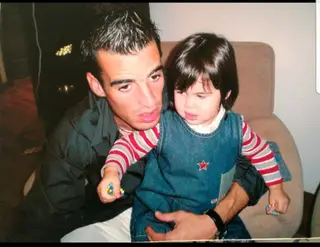 Marco com a filha, quando era bebé