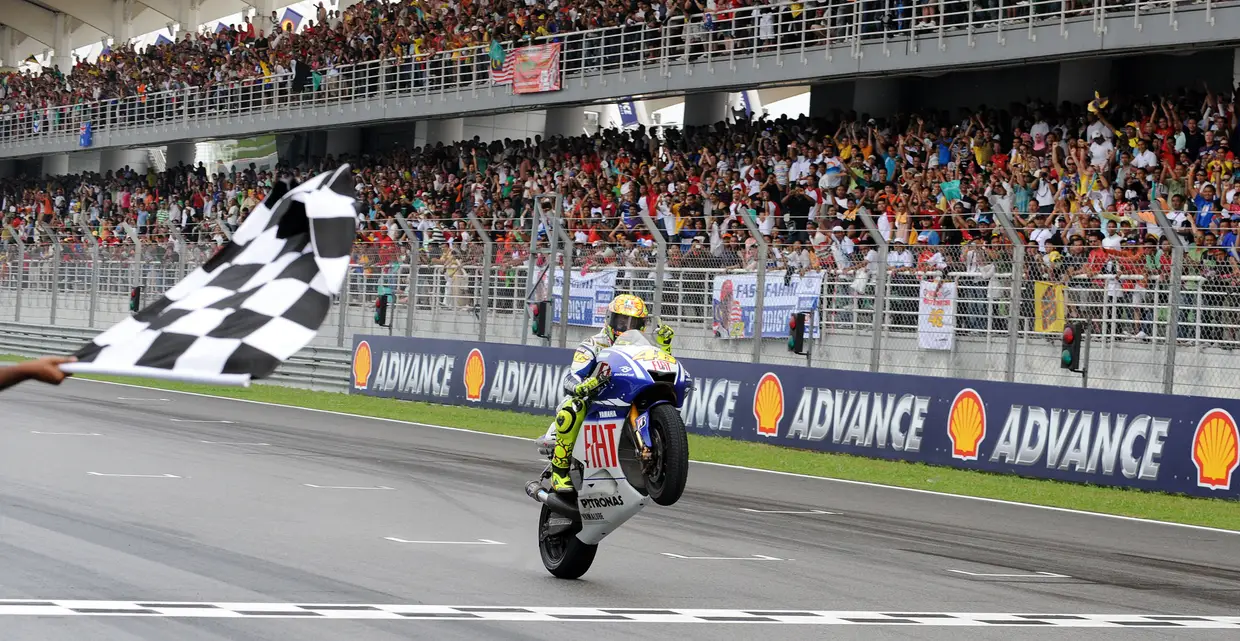 Rossi festeja a conquista do 9.º e último título mundial, no GP Malásia de 2009