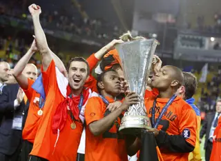 A festa da Taça UEFA, em 2009, com Willian e Luiz Adriano