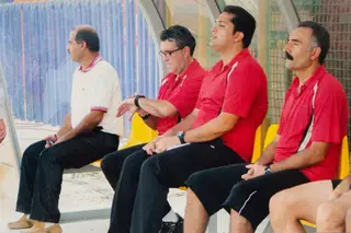 No banco com a equipa técnica, no Irão
