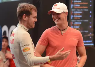 Vettel ao lado de Schumacher, o seu ídolo de infância
