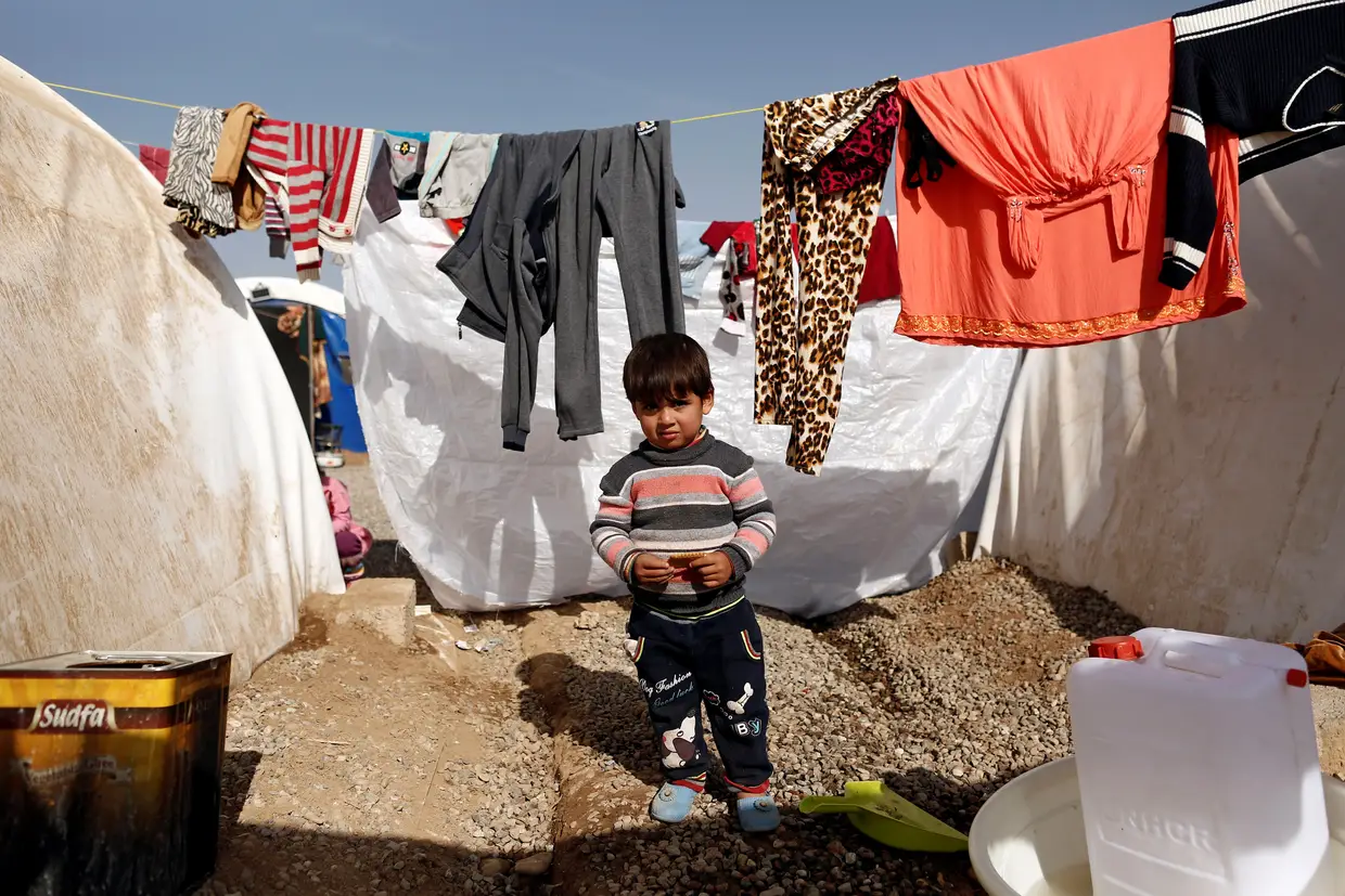 Mohamed de 2 anos nasceu em Mosul. Está agora no campo de refugiados de Khazer, no Iraque.