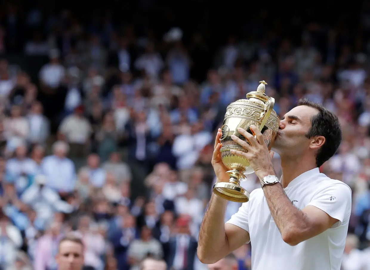O tenista suíço Roger Federer tornou-se no recordista de vitórias em Wimbledon, ao conquistar o seu oitavo título na relva londrina, com um triunfo sobre o croata Marin Cilic, em três sets.