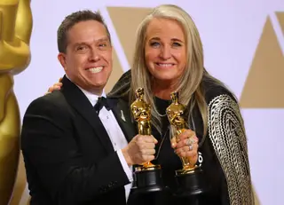 O realizador Lee Unkrich e a produtora Darla K. Anderson.