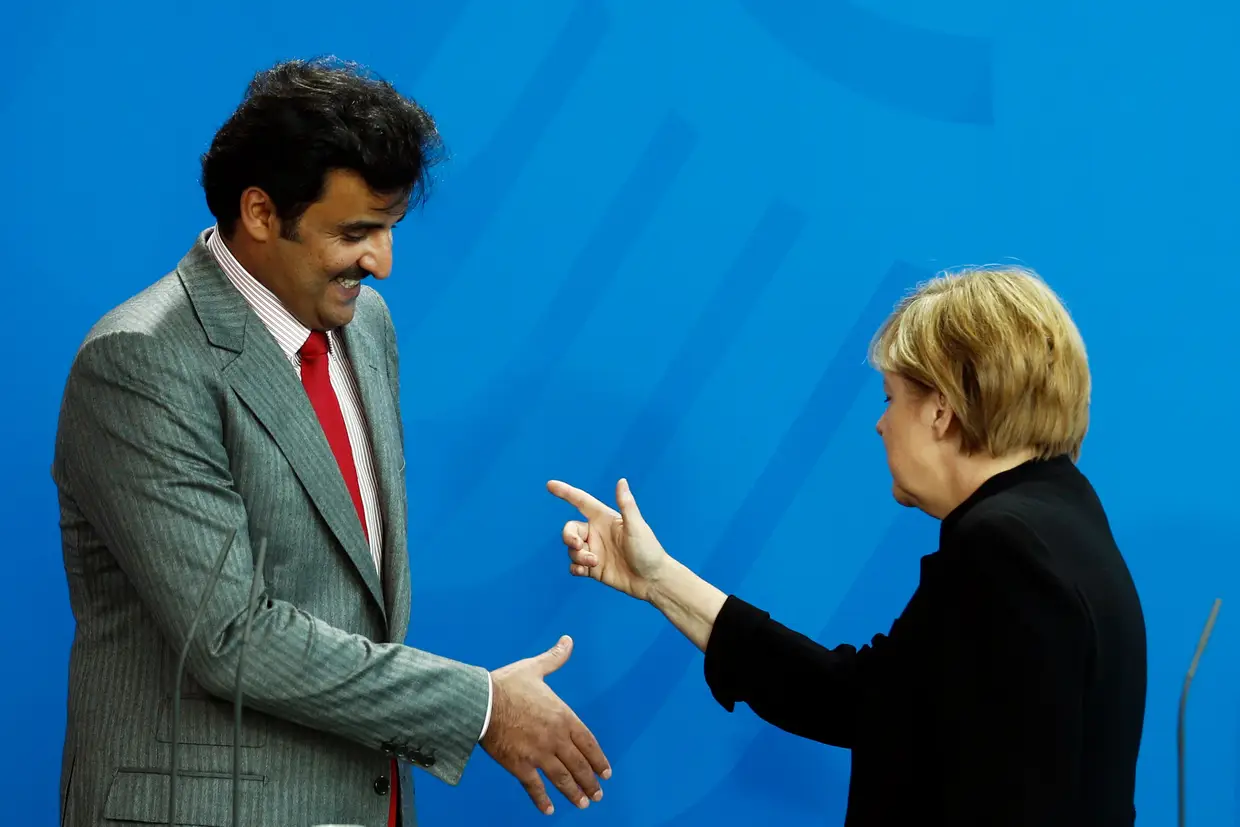 Angela Merkel e o líder do Qatar, o xeque Tamim bin Hamad al-Thani, 2014