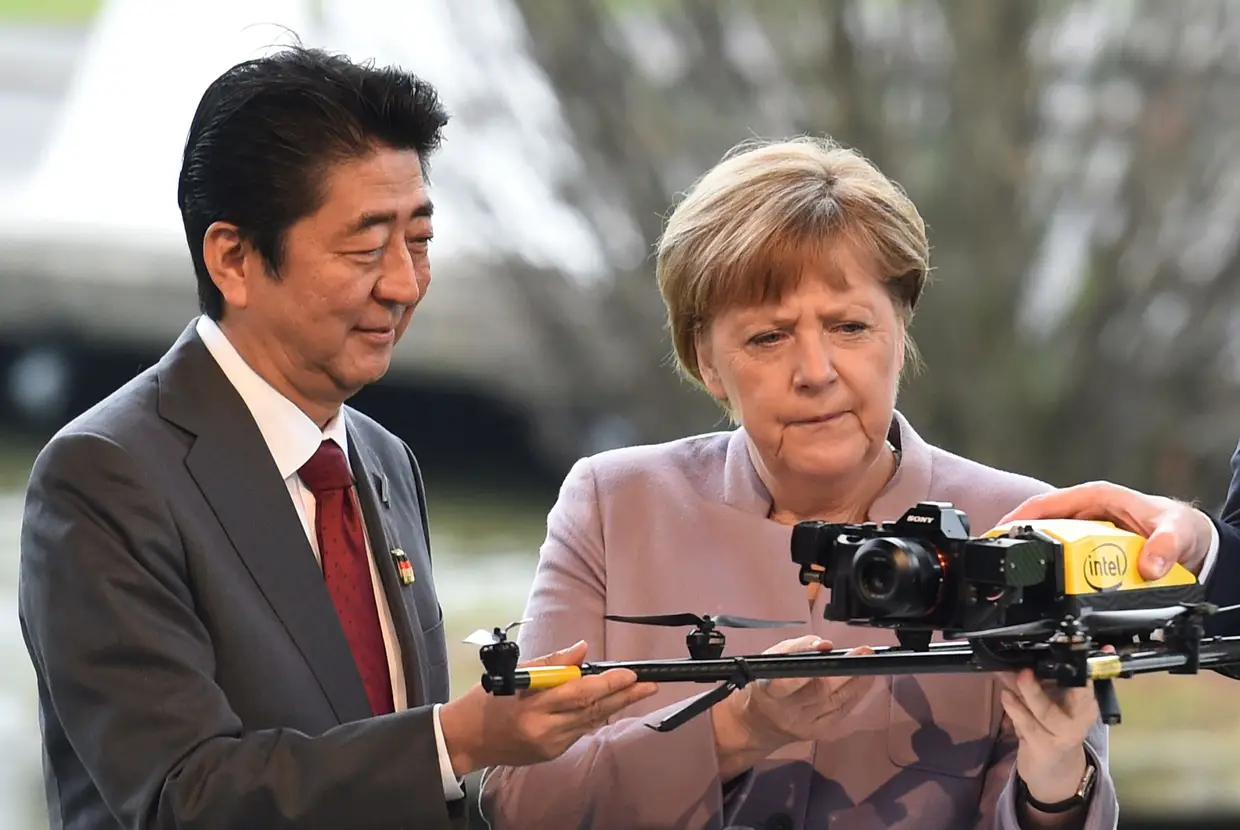 Angela Merkel e o primeiro-ministro do Japão, Shinzo Abe, 2017