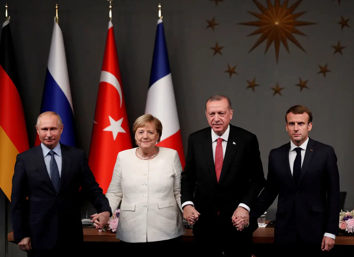 Angela Merkel, o Presidente russo, Vladimir Putin, o Presidente turco, Tayyip Erdogan, e o Presidente francês, Emmanuel Macron, 2018