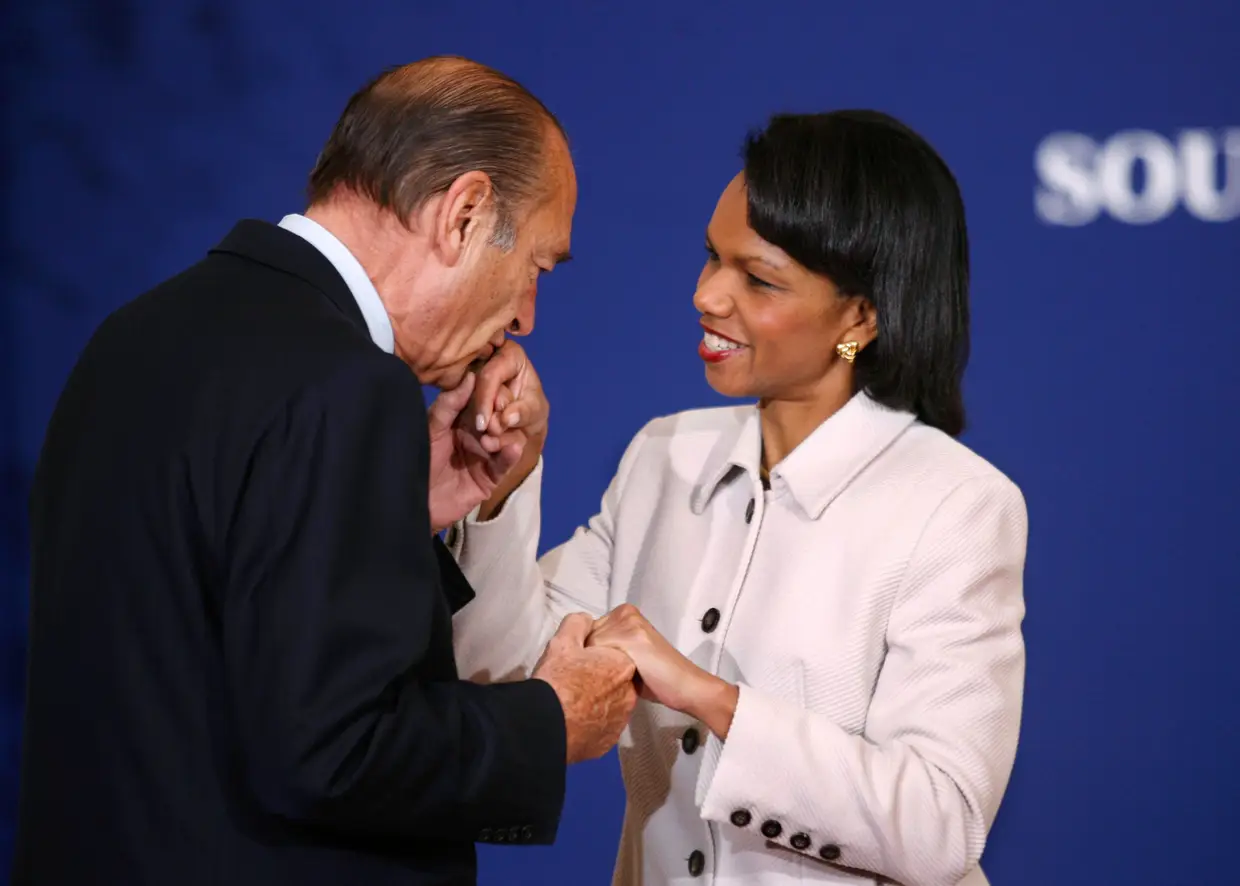 Jacques Chirac com a antiga chefe da diplomacia dos EUA Condoleezza Rice