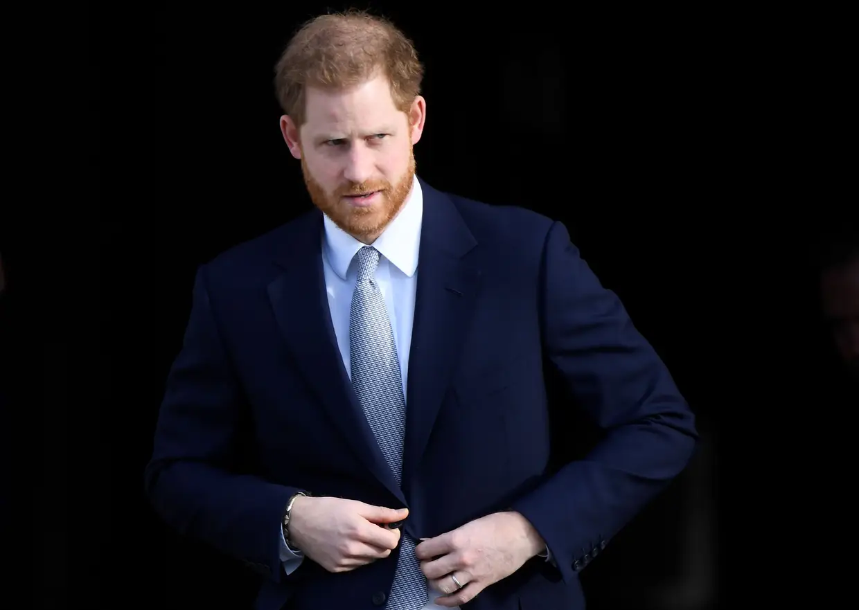 O primeiro compromisso oficial do príncipe Harry após o anúncio do afastamento da família real britânica, num evento de rugby nos jardins do Buckingham Palace, em Londres.