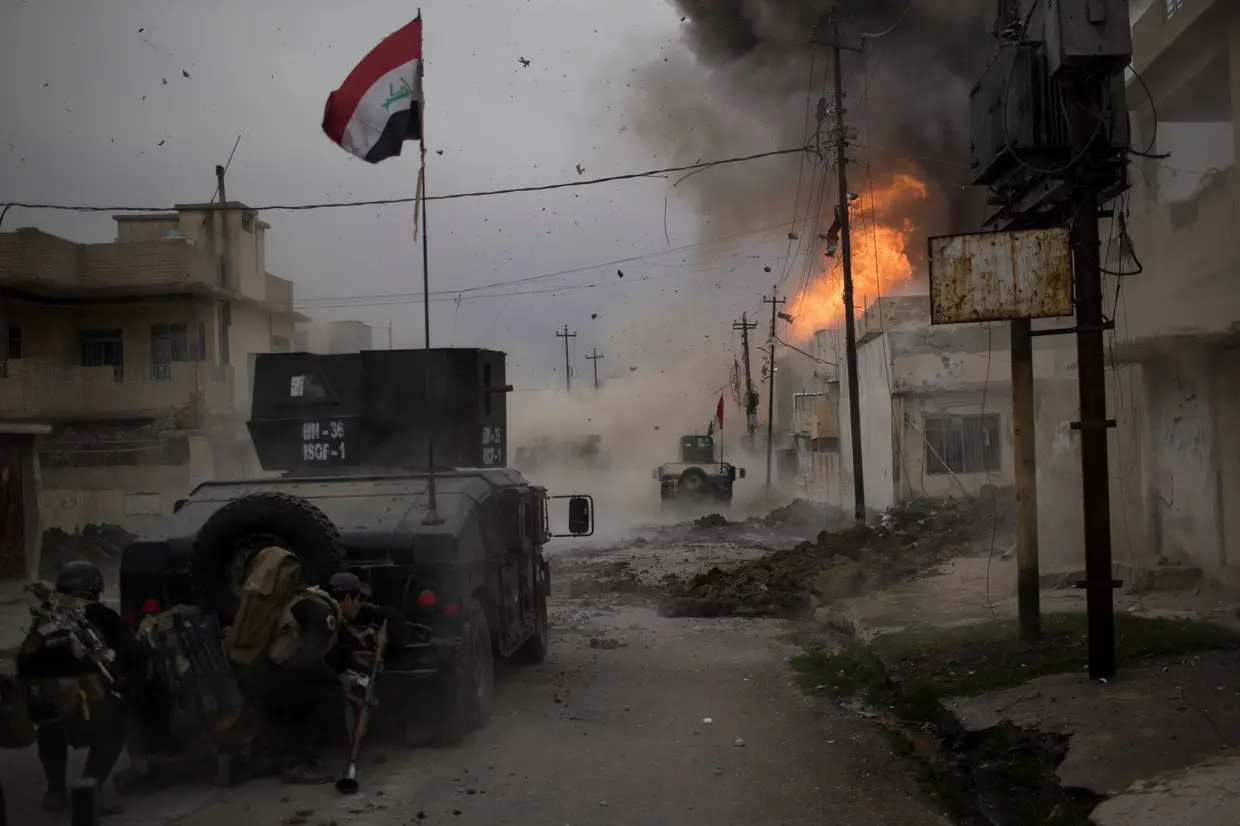 Categoria Notícias, terceiro lugar. A Batalha de Mosul, por Felipe Dana, do Brasil