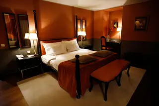 Os quartos do Palácio da Lousã Boutique Hotel estão divididos entre o edifício antigo e a ala moderna