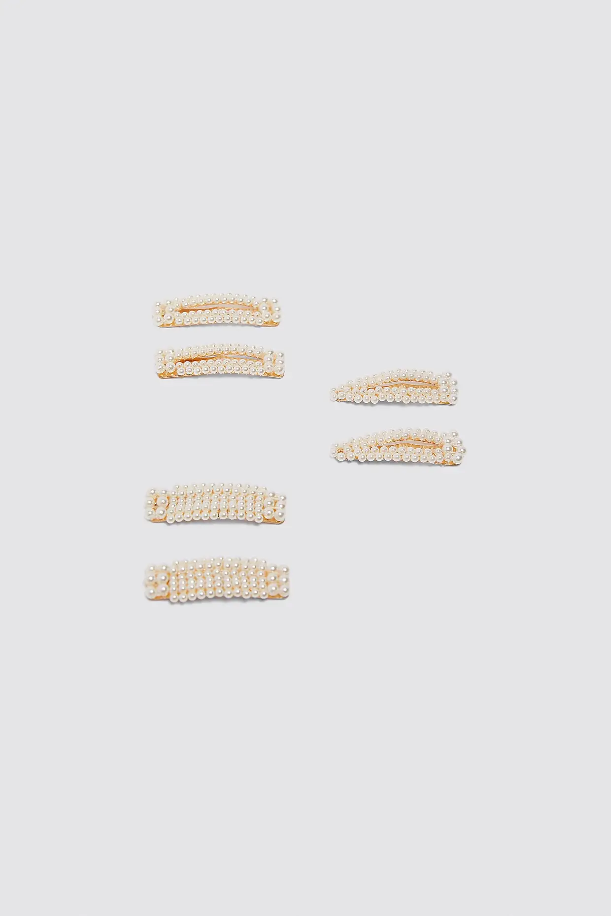 Conjunto de mini ganchos com aplicações de pérolas, Zara, €12,95