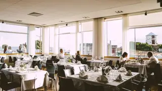 O restaurante está situado em frente aos típicos moinhos da Apúlia