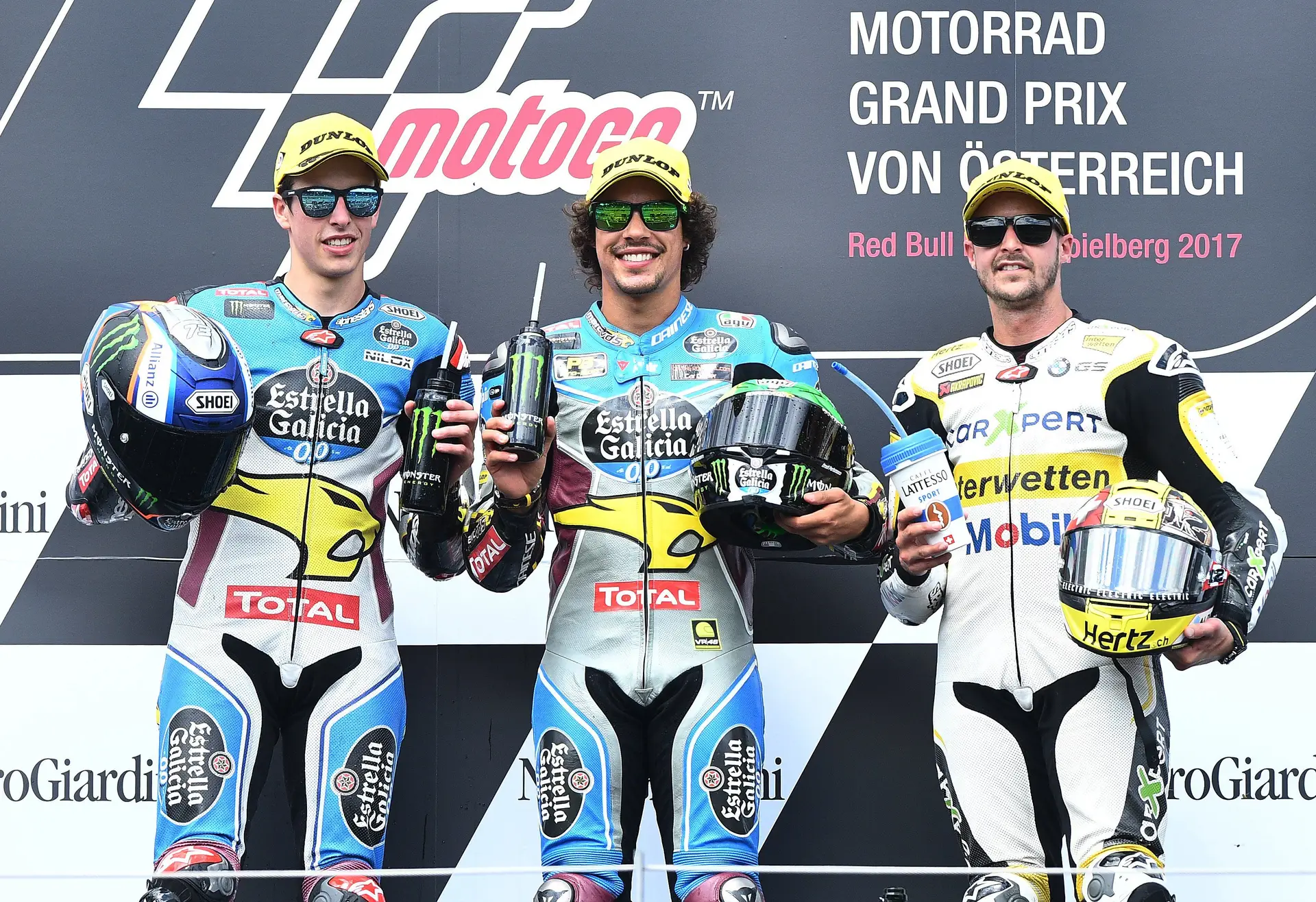 Franco Morbidelli (ao centro), Alex Marquez (à esq.) e Thomas Luhti (à dir.) no pódio do Grande Prémio da Áustria