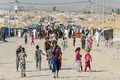 Mulheres e crianças yazidis escondidas à vista de todos