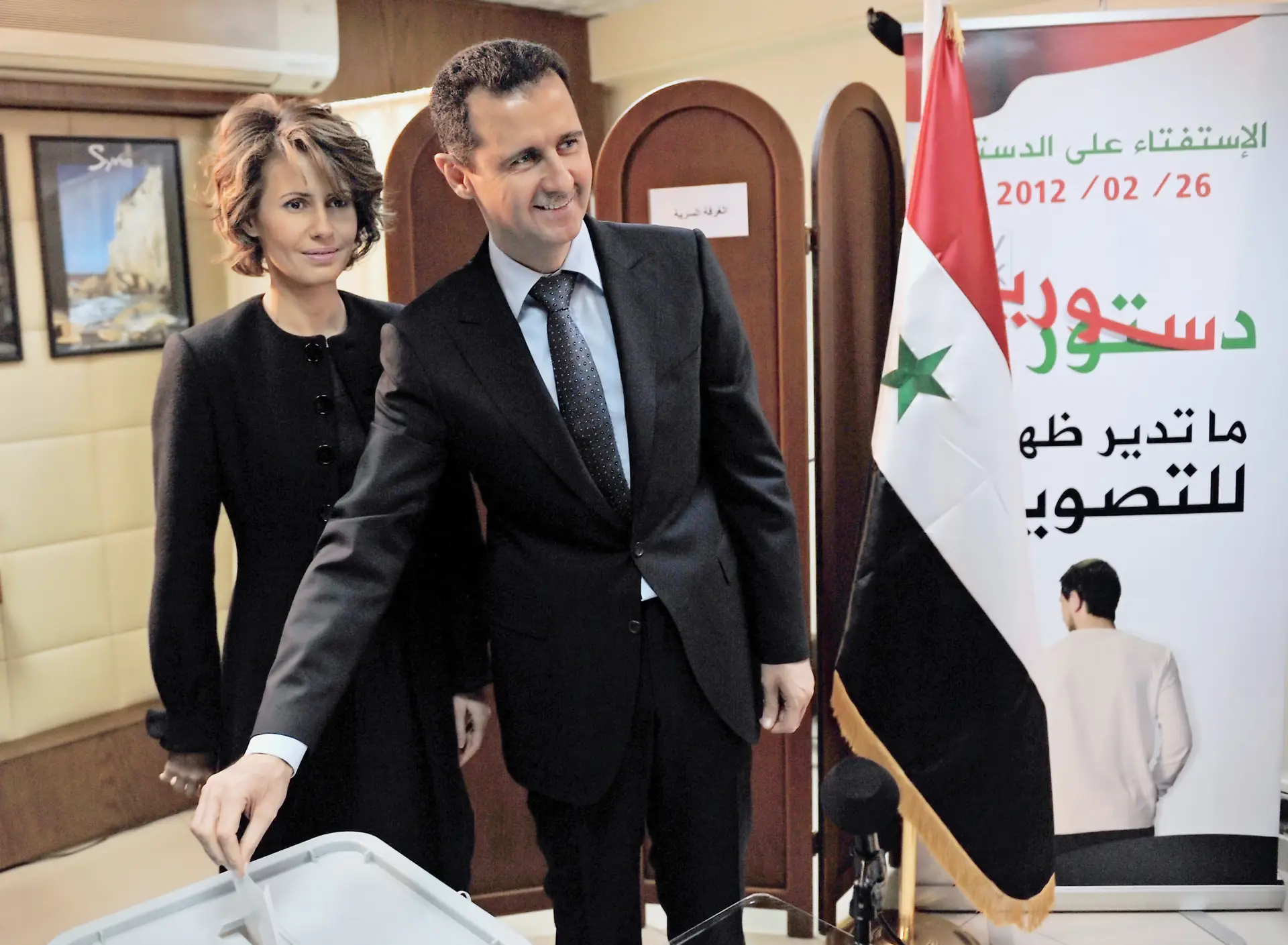 Bashar al-Assad e a mulher, Asma al-Assad, numa foto de 2012