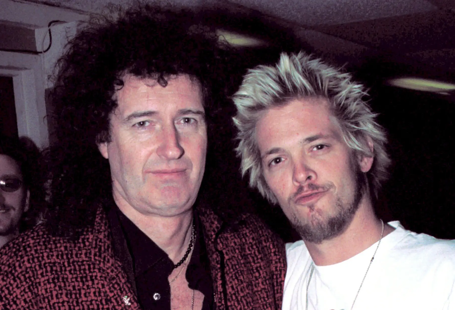 Brian May, dos Queen, e Taylor Hawkins, dos Foo Fighters