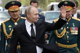 Alexander Zhuravlyov, à direita de Putin
