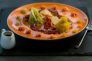 Polvo com citrinos e três pimentos
