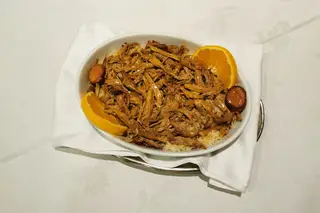 Pato corado com arroz