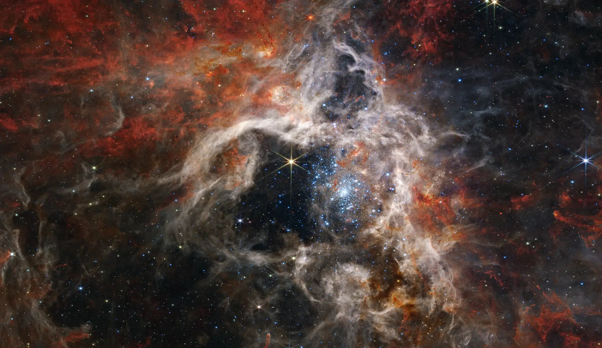 Nebulosa da Tarântula, berço das milhares de estrelas mais quentes e massivas conhecidas