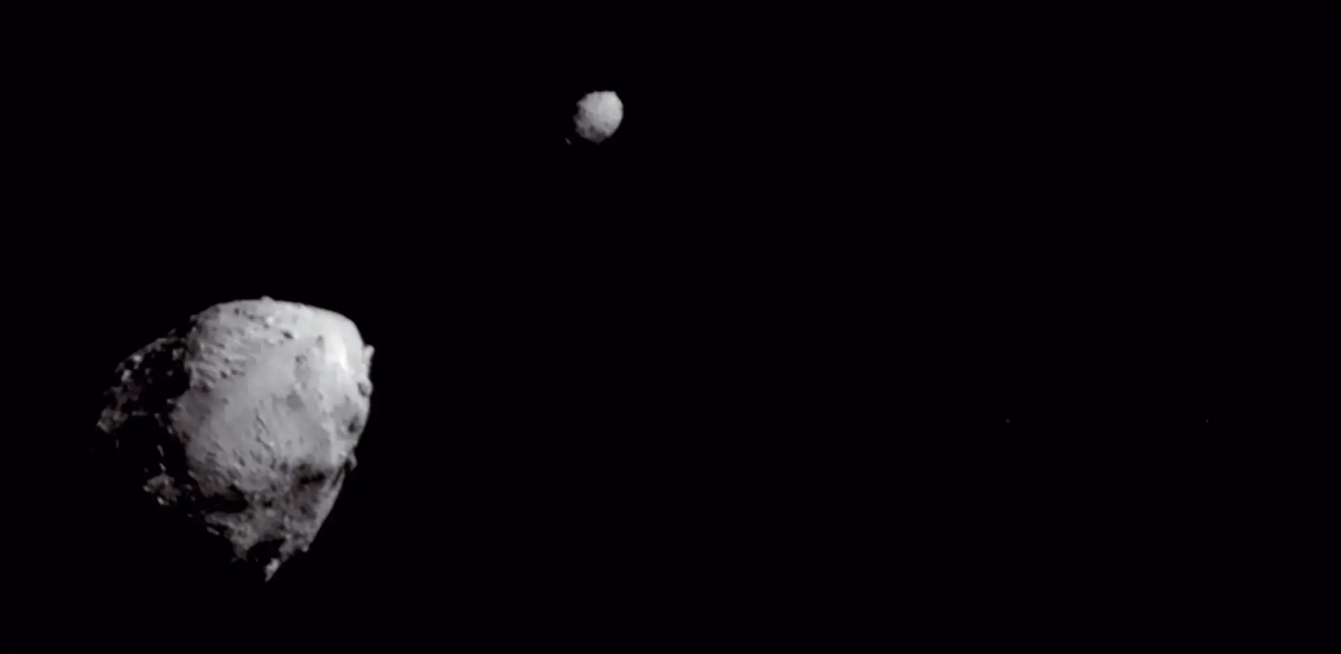 COLISÃO Imagem do sistema binário de asteroides captada pela câmara DRACO, instalada na sonda DART, momentos antes do impacto com o pequeno Dimorphos