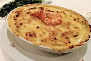 Bacalhau gratinado, a especialidade maior do restaurante