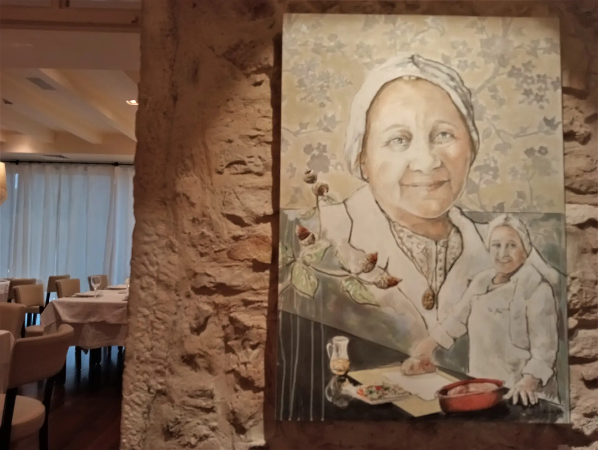 Retrato da fundadora, Maria Alice Marto, numa das paredes do restaurante