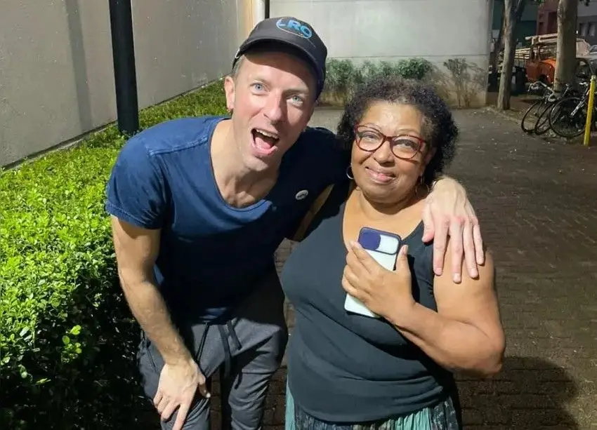 Chris Martin, dos Coldplay, e Dona Tati