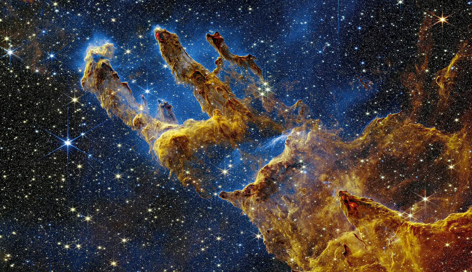 Foto captada pelo super-telescópio James Webb dos “Pilares da Criação”, aglomerado de poeira e gás a 6500 anos-luz de distância da Terra