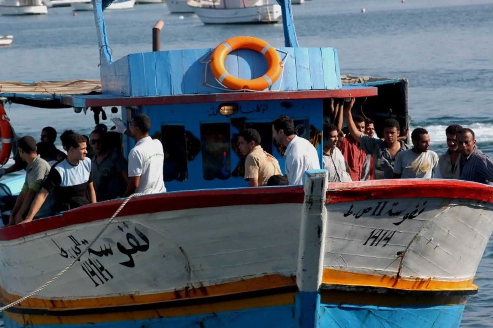 Refugiados chegam a Lampedusa, Itália