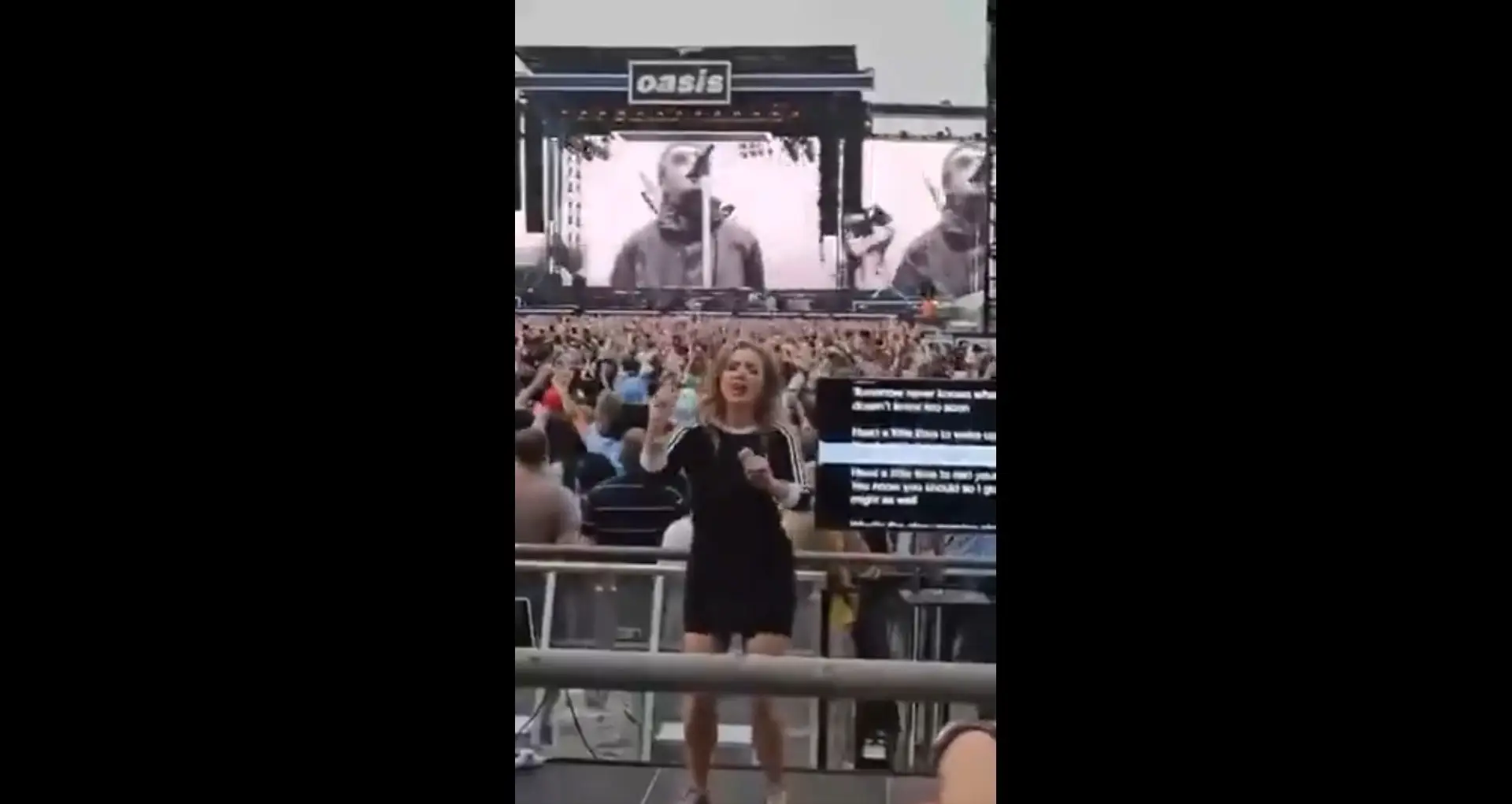 Intérprete de língua gestual dança fervorosamente em concerto dos Oasis
