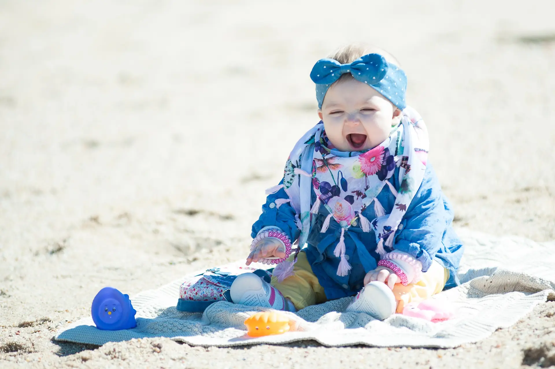 "A girl with a curious and happy look"