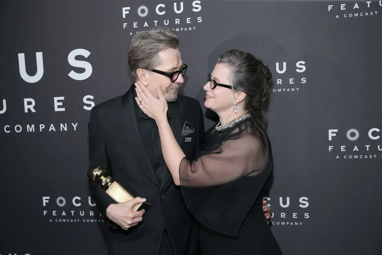 Gary Oldman e Gisele Schmidt