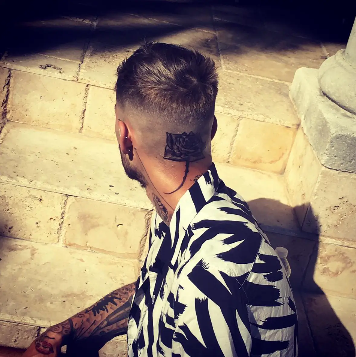 Fãs pedem a Zayn Malik para parar de se tatuar