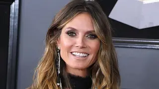 Foto polémica de Heidi Klum com animal gera onda de críticas e insultos
