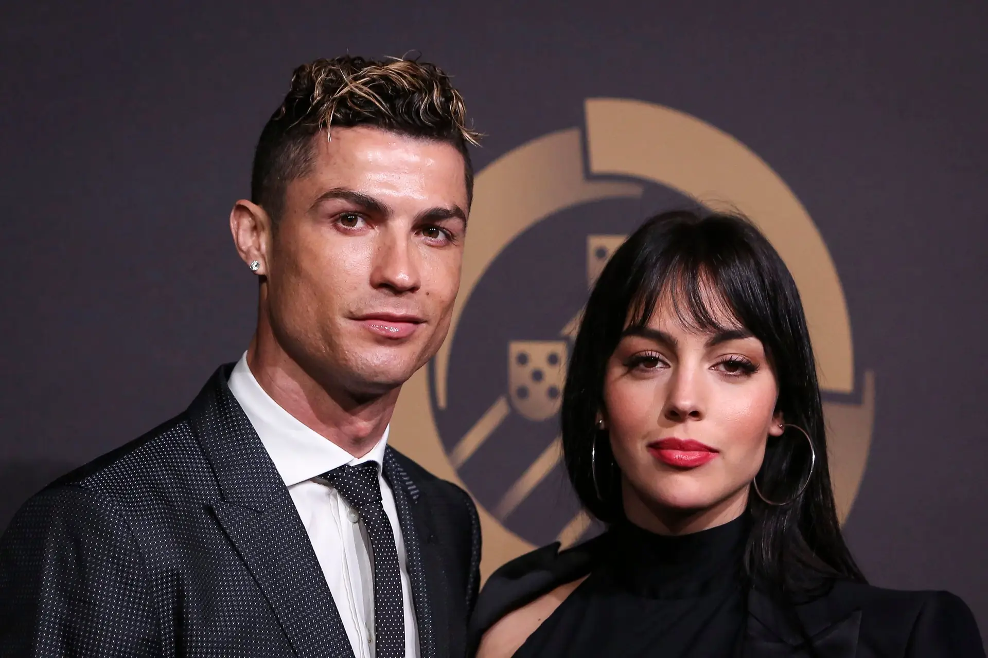 Portugal’s forward Cristiano Ronaldo (L) accompanied by Georgina Rodriguez pose on arrival at ‘Quinas de Ouro’ ceremony held at Pavilhao Carlos Lopes in Lisbon, on March 19, 2018. NURPHOTO/CARLOS COSTA. (Photo by Carlos Costa/NurPhoto via Getty Images)