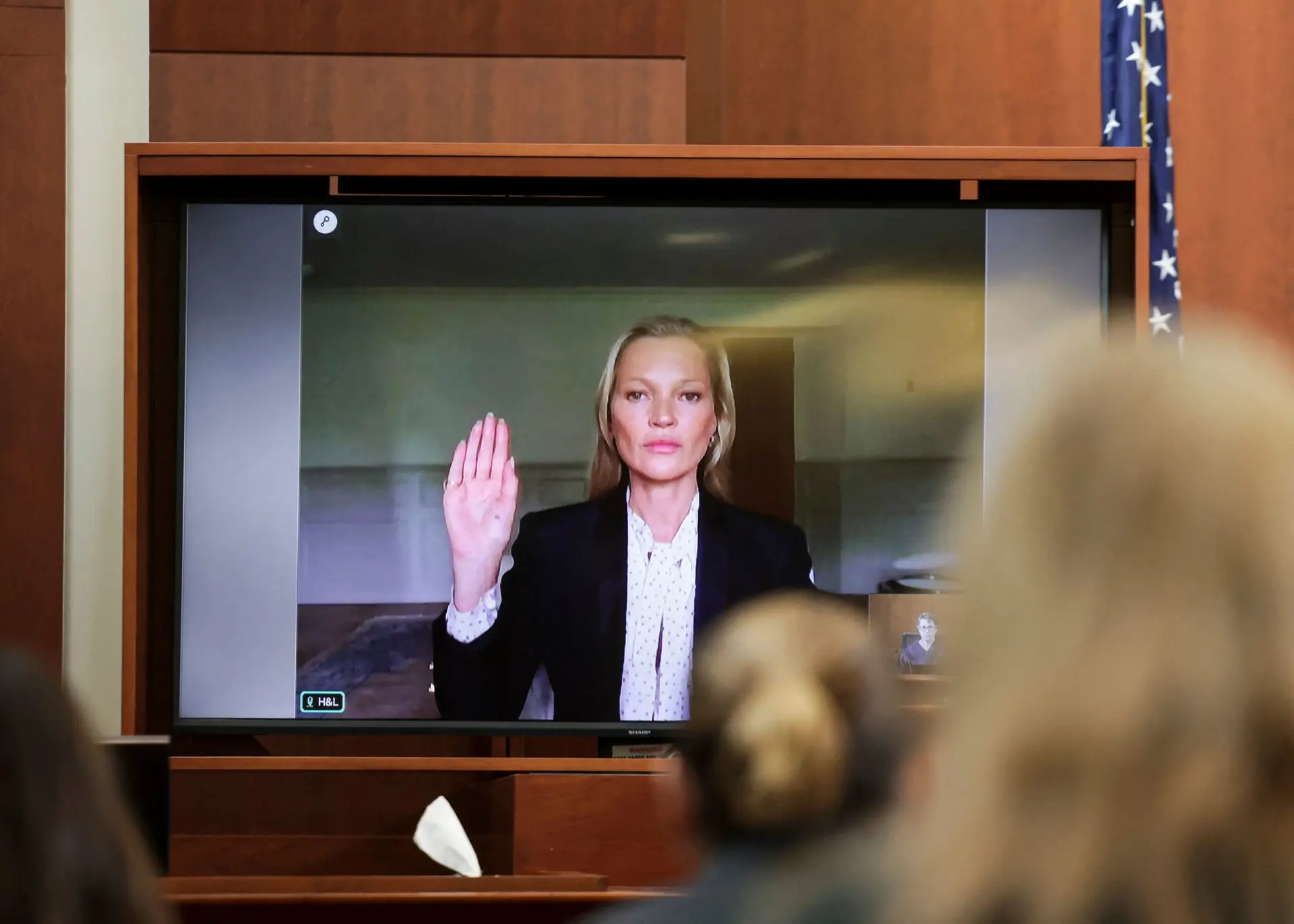 TOPSHOT – Model Kate Moss is sworn in via video link at the Fairfax County Circuit Courthouse in Fairfax, Virginia, on May 25, 2022. – Actor Johnny Depp is suing ex-wife Amber Heard for libel after she wrote an op-ed piece in The Washington Post in 2018 referring to herself as a public figure representing domestic abuse. (Photo by EVELYN HOCKSTEIN / POOL / AFP) (Photo by EVELYN HOCKSTEIN/POOL/AFP via Getty Images)