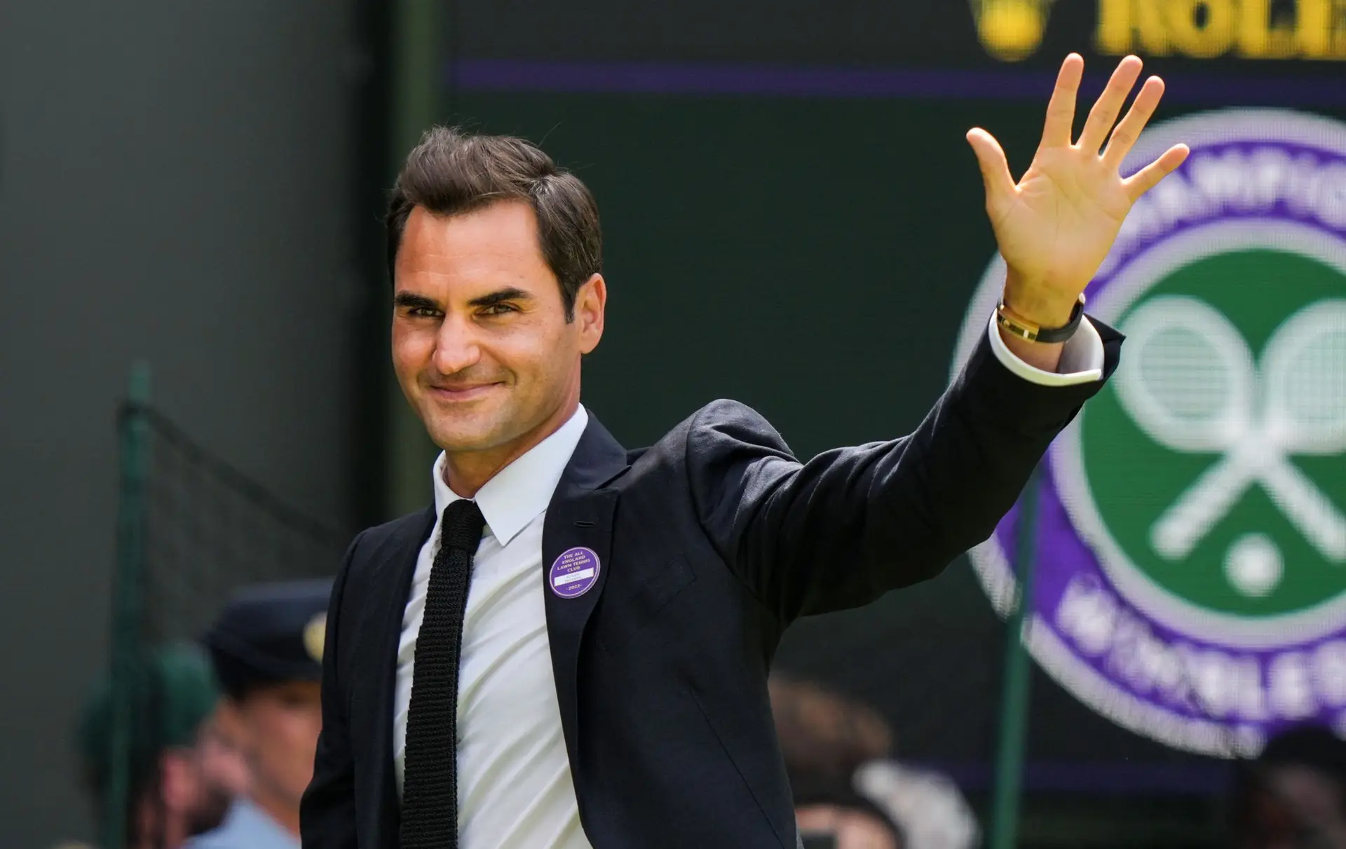 LONDON, ENGLAND – JULY 03: Roger Federer of Switzerland greets the audience during the Centre Court Centenary Celebration during day seven of The Championships Wimbledon 2022 at All England Lawn Tennis and Croquet Club on July 03, 2022 in London, England. (Photo by Shi Tang/Getty Images)