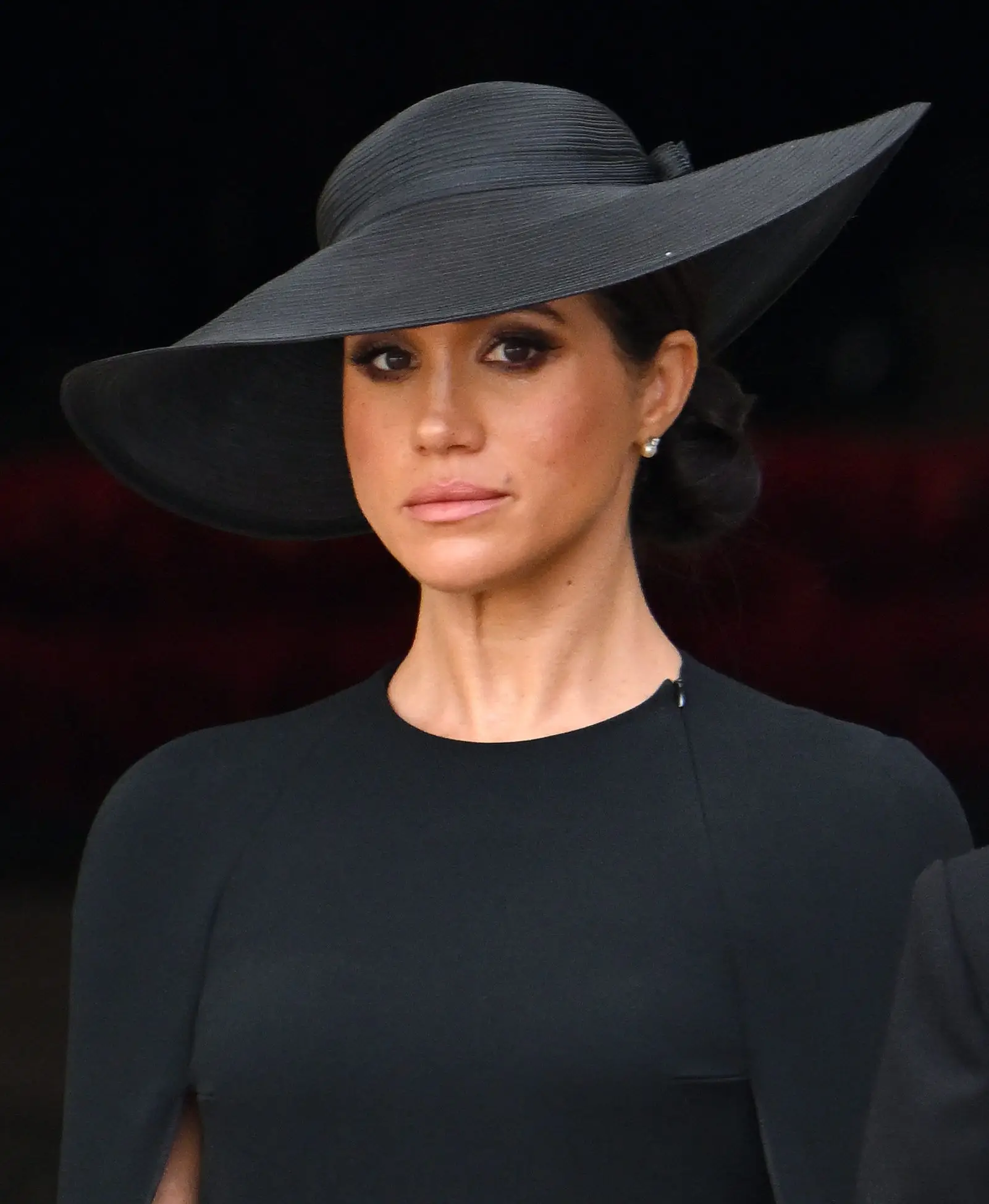 LONDON, ENGLAND – SEPTEMBER 19: Meghan, Duchess of Sussex during the State Funeral of Queen Elizabeth II at Westminster Abbey on September 19, 2022 in London, England. Elizabeth Alexandra Mary Windsor was born in Bruton Street, Mayfair, London on 21 April 1926. She married Prince Philip in 1947 and ascended the throne of the United Kingdom and Commonwealth on 6 February 1952 after the death of her Father, King George VI. Queen Elizabeth II died at Balmoral Castle in Scotland on September 8, 2022, and is succeeded by her eldest son, King Charles III. (Photo by Karwai Tang/WireImage)
