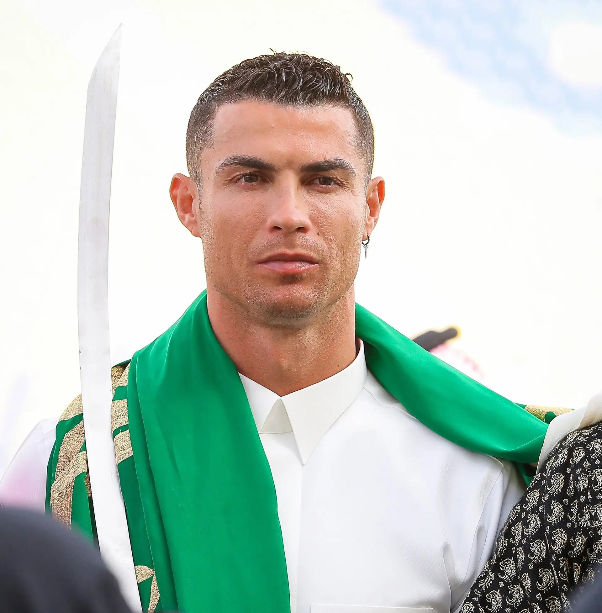 RIYADH, SAUDI ARABIA – FEBRUARY 22: (—-EDITORIAL USE ONLY â MANDATORY CREDIT – ‘AL NASSR CLUB OF SAUDI ARABIA / HANDOUT’ – NO MARKETING NO ADVERTISING CAMPAIGNS – DISTRIBUTED AS A SERVICE TO CLIENTS—-) Cristiano Ronaldo of Al Nassr performs sword dance with traditional clothes within the celebrations for Saudi Arabia’s founding anniversary in Riyadh, Saudi Arabia on February 22, 2023. (Photo by Al Nassr Club of Saudi Arabia/HAndout/Anadolu Agency via Getty Images)