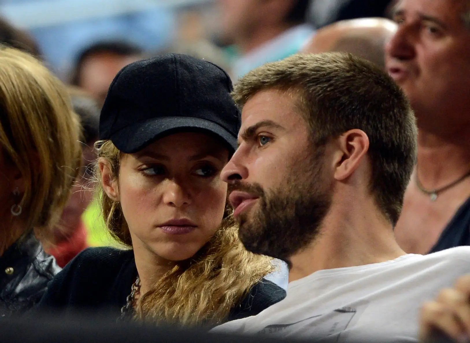BARCELONA, SPAIN – DECEMBER 9: Gerard Pique of Barcelona (R) and his wife Colombian singer Shakira (L) attend the 2014 FIBA Basketball World Cup quarter final match between Slovenia and USA at the Palau Sant Jordi in Barcelona, Spain on September 09, 2014. (Photo by Evrim Aydin/Anadolu Agency/Getty Images)
