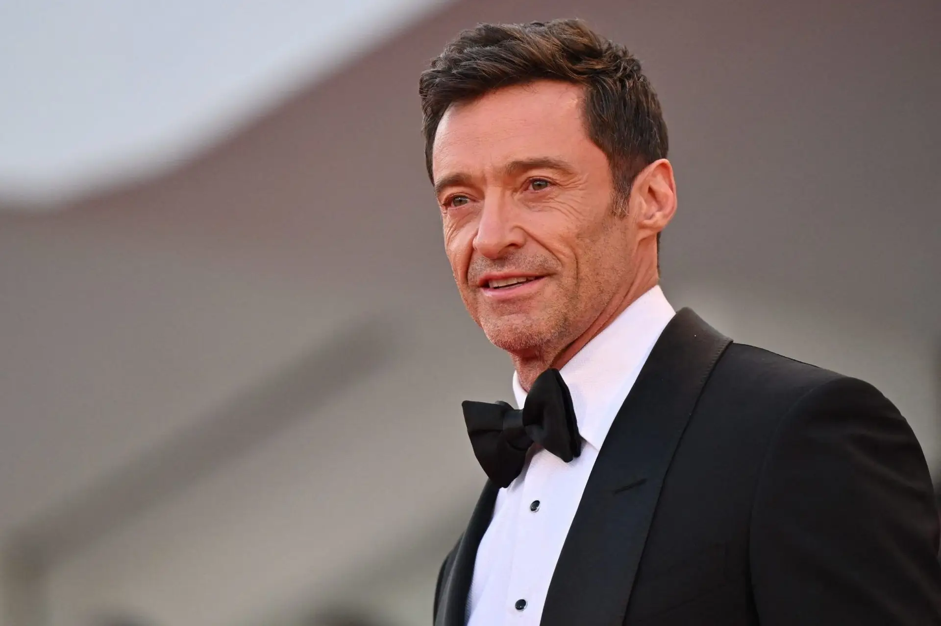 Australian actor Hugh Jackman arrives on September 7, 2022 for the screening of the film “The Son” presented in the Venezia 79 competition as part of the 79th Venice International Film Festival at Lido di Venezia in Venice, Italy. (Photo by Tiziana FABI / AFP) (Photo by TIZIANA FABI/AFP via Getty Images)
