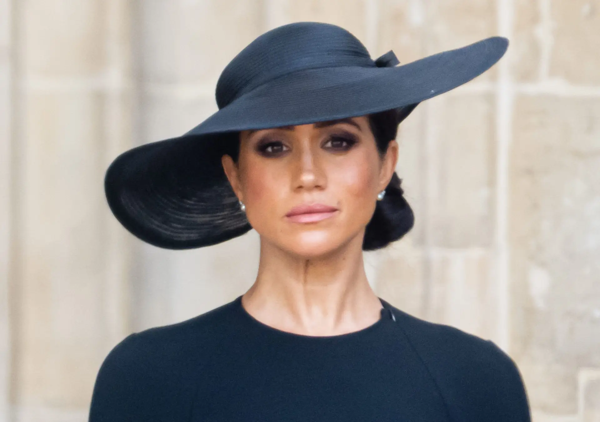 LONDON, ENGLAND – SEPTEMBER 19: (L-R) Meghan, Duchess of Sussexduring the State Funeral of Queen Elizabeth II at Westminster Abbey on September 19, 2022 in London, England. Elizabeth Alexandra Mary Windsor was born in Bruton Street, Mayfair, London on 21 April 1926. She married Prince Philip in 1947 and ascended the throne of the United Kingdom and Commonwealth on 6 February 1952 after the death of her Father, King George VI. Queen Elizabeth II died at Balmoral Castle in Scotland on September 8, 2022, and is succeeded by her eldest son, King Charles III. (Photo by Samir Hussein/WireImage)
